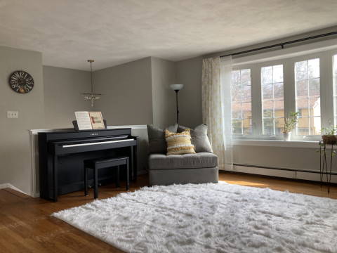 View of the living room from dining area after makeover